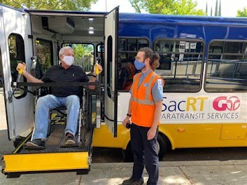 Customer boarding SacRT Go vehicle